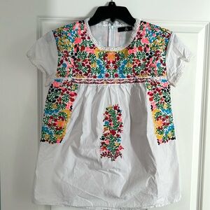 Size small top. Zipper feature on back